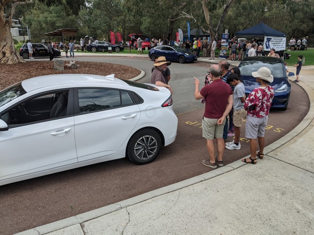 Chris explaining EVs to potential buyers